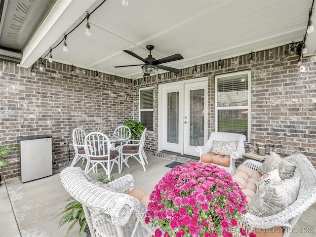 view of patio featuring an outdoor hangout area, french doors, and ceiling fan