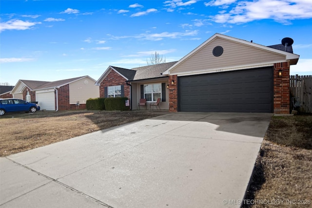 ranch-style house featuring a garage