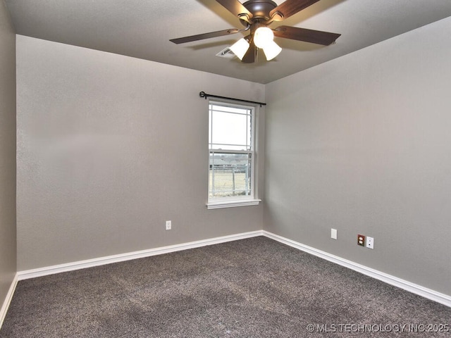 carpeted empty room featuring ceiling fan