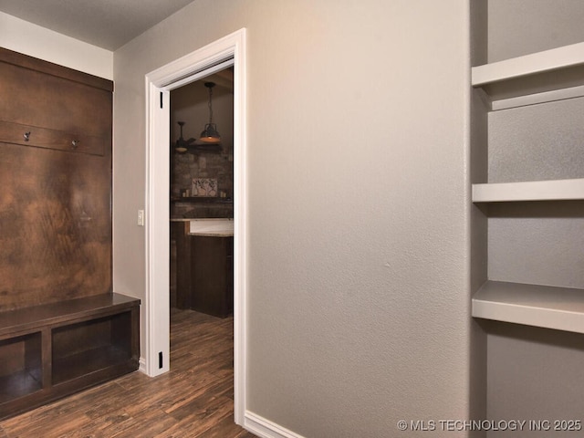 mudroom with dark hardwood / wood-style floors