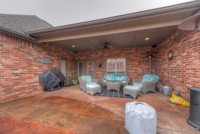 view of patio featuring a grill, outdoor lounge area, and ceiling fan