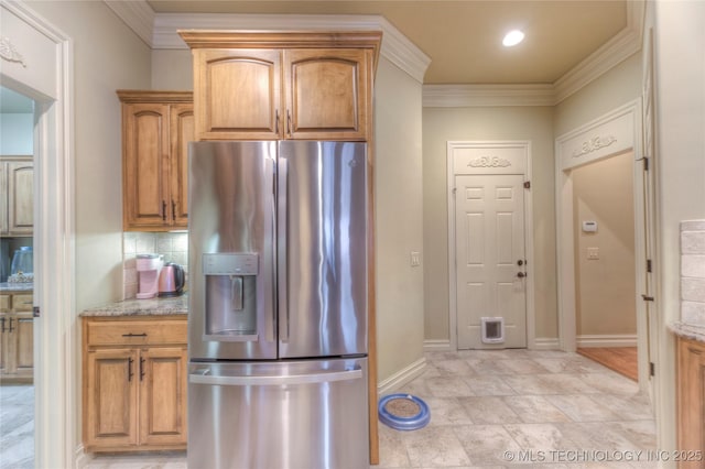 kitchen with stainless steel fridge with ice dispenser, decorative backsplash, ornamental molding, and light stone countertops