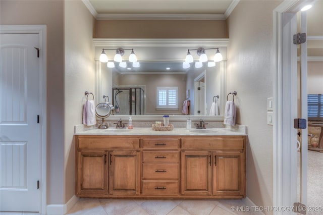 bathroom with tile patterned flooring, crown molding, vanity, and a shower with shower door