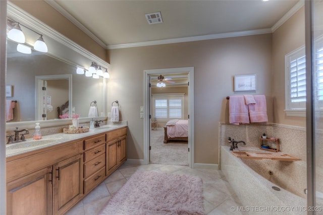 bathroom with tile patterned floors, ornamental molding, and vanity