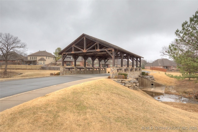 view of community featuring a gazebo and a yard