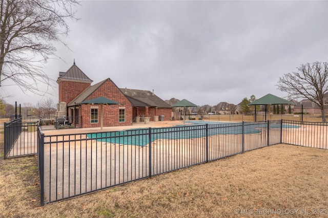 view of swimming pool featuring a patio area