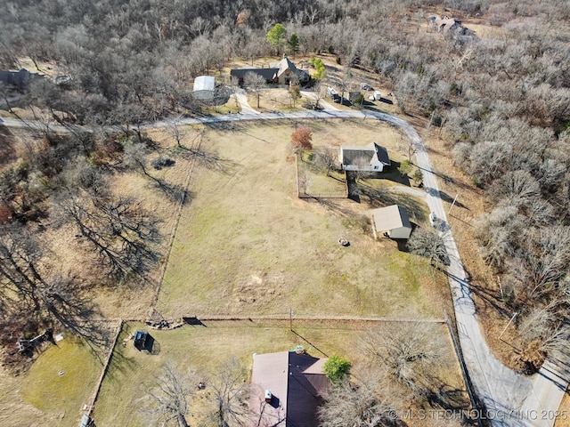 birds eye view of property featuring a rural view