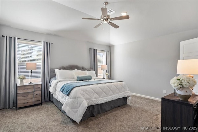 bedroom with light carpet, vaulted ceiling, and ceiling fan