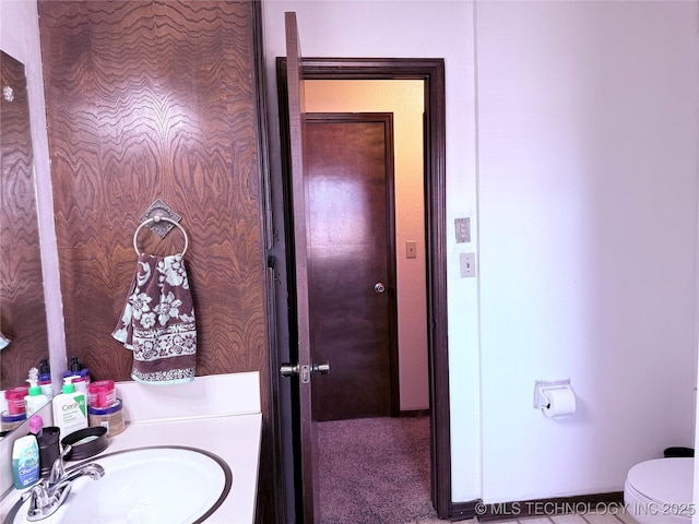 bathroom with sink and toilet