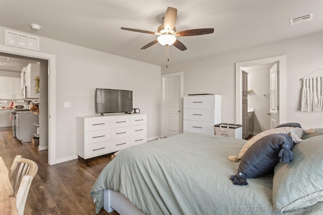 bedroom featuring ceiling fan and dark hardwood / wood-style floors