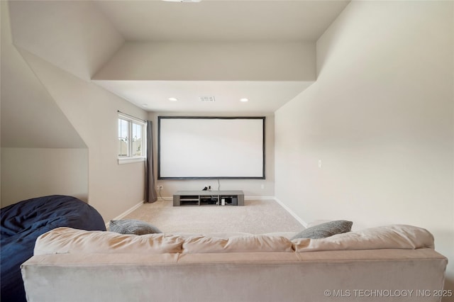 home theater room featuring light carpet