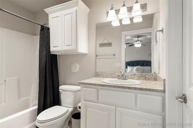 full bathroom with toilet, vanity, ceiling fan, and shower / bath combo with shower curtain