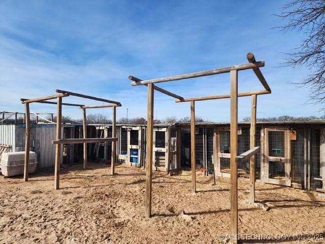 view of play area with an outbuilding