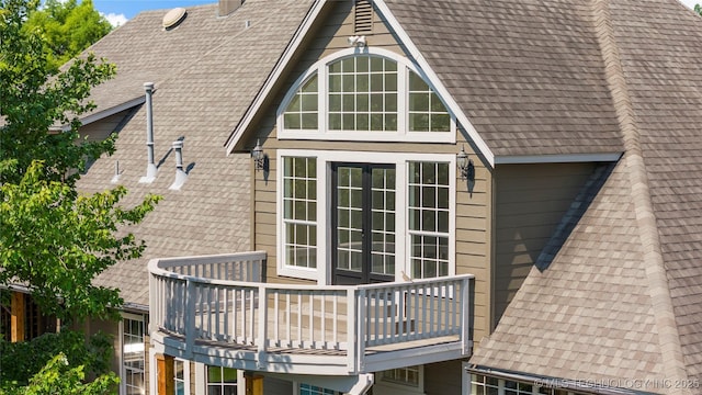 view of home's exterior with a balcony