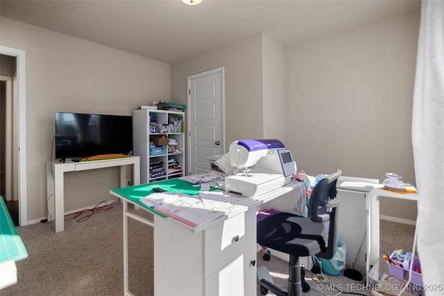 carpeted office with baseboards