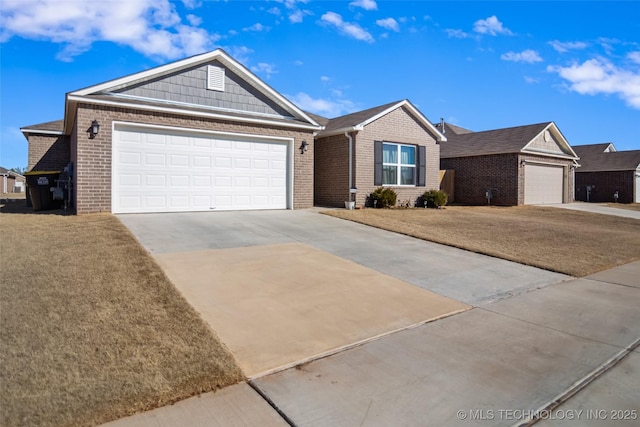 ranch-style house featuring a garage, driveway, a front yard, and brick siding