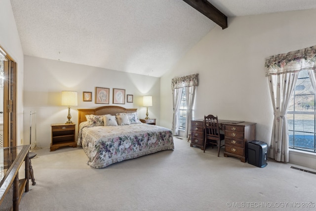 carpeted bedroom with beam ceiling, high vaulted ceiling, and a textured ceiling