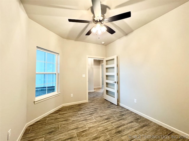 unfurnished bedroom featuring ceiling fan and wood-type flooring