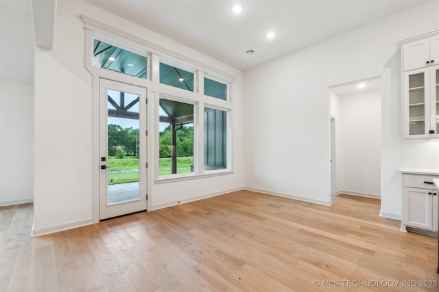 2722 E 134th Cir, Bixby, OK 74008 - unfurnished dining area with light wood finished floors and recessed lighting
