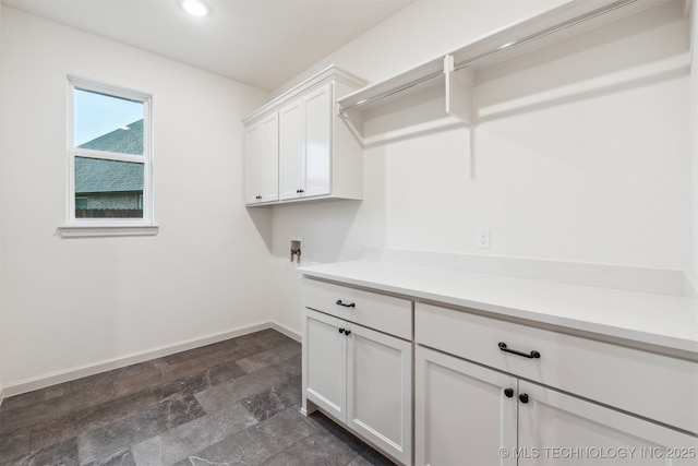 2722 E 134th Cir, Bixby, OK 74008 - washroom with cabinet space, dark stone finish flooring, hookup for a washing machine, and recessed lighting