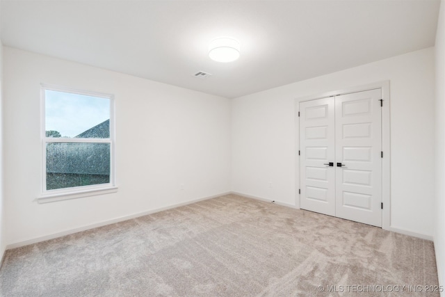 2722 E 134th Cir, Bixby, OK 74008 - carpeted spare room with baseboards