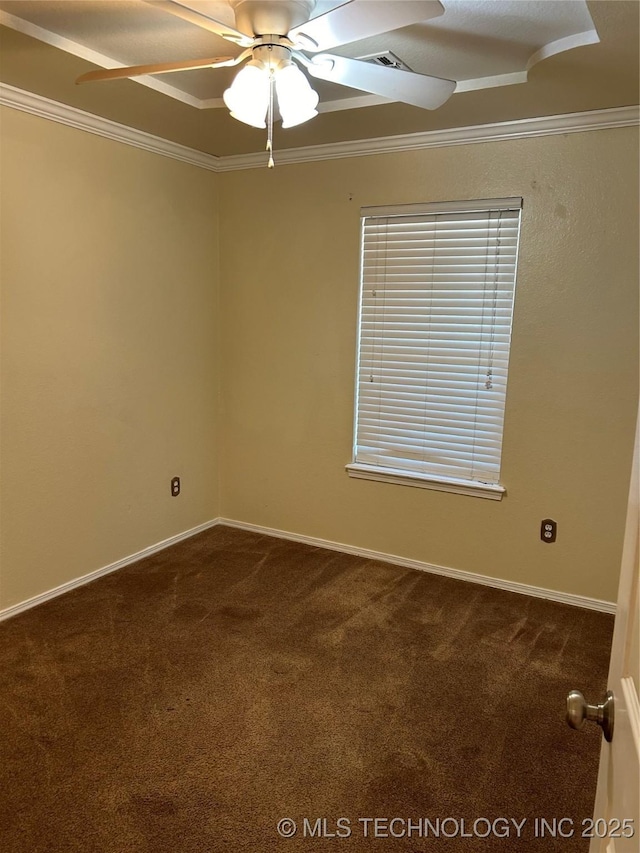 carpeted empty room with crown molding and ceiling fan