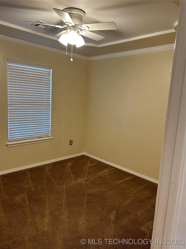 spare room with crown molding, carpet flooring, a textured ceiling, and ceiling fan