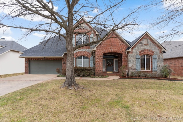 view of front of house with a garage and a front lawn