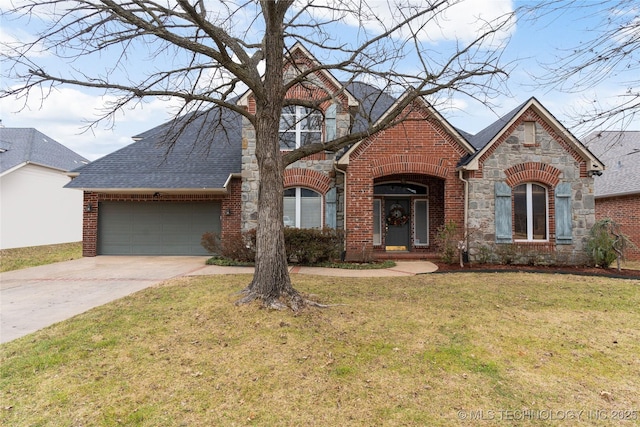 view of front facade with a garage and a front yard