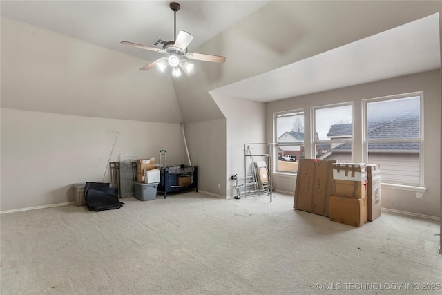 additional living space featuring light carpet, vaulted ceiling, and ceiling fan