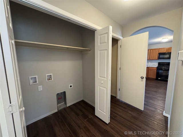 washroom with washer hookup, dark hardwood / wood-style flooring, and electric dryer hookup