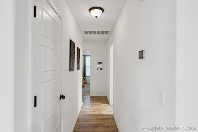 hall featuring light hardwood / wood-style flooring