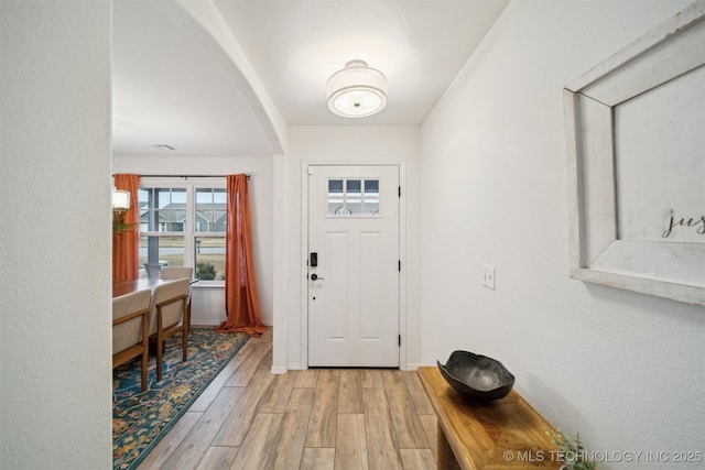 entrance foyer with light hardwood / wood-style floors