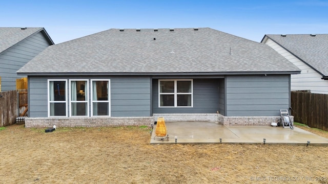 rear view of property with a patio area