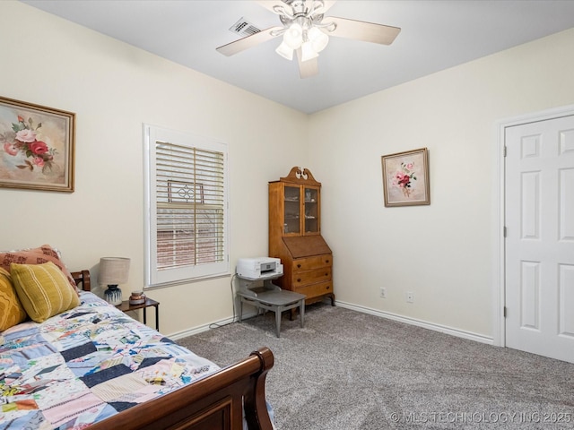 bedroom with carpet flooring, baseboards, a ceiling fan, and visible vents