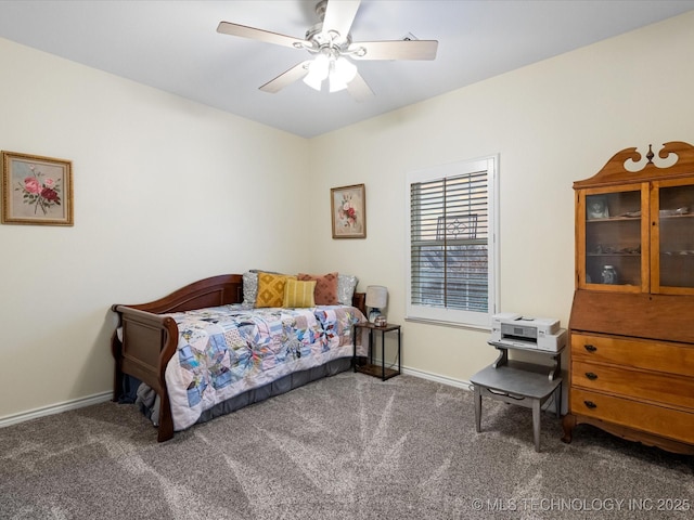 bedroom with carpet, baseboards, and ceiling fan