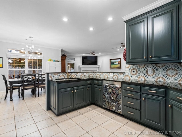 kitchen with crown molding, stainless steel dishwasher, a sink, and light tile patterned floors