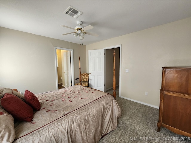 carpeted bedroom with ensuite bath and ceiling fan