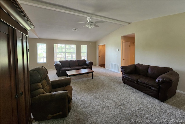 living room with vaulted ceiling with beams, ceiling fan, and carpet flooring