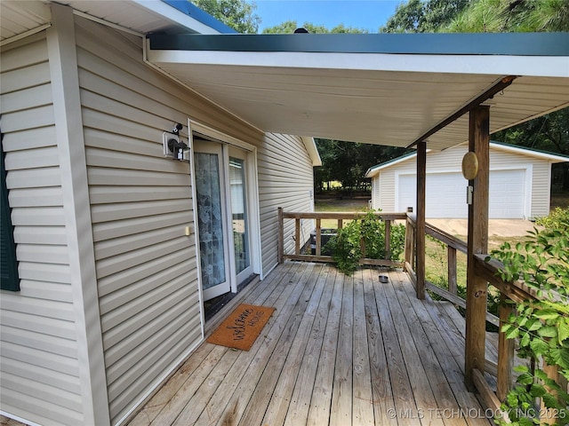 wooden deck with a garage