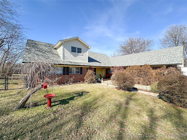 view of front of house with a front lawn