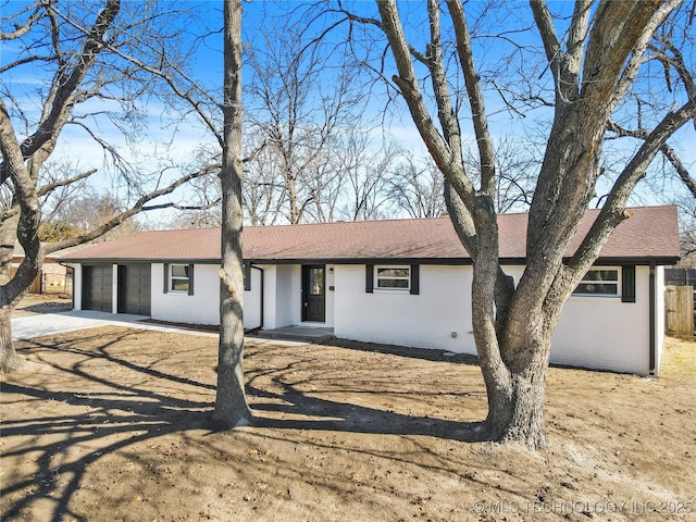 single story home with a garage