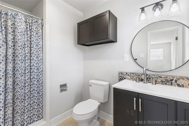 bathroom featuring vanity, tile patterned flooring, a shower with curtain, and toilet