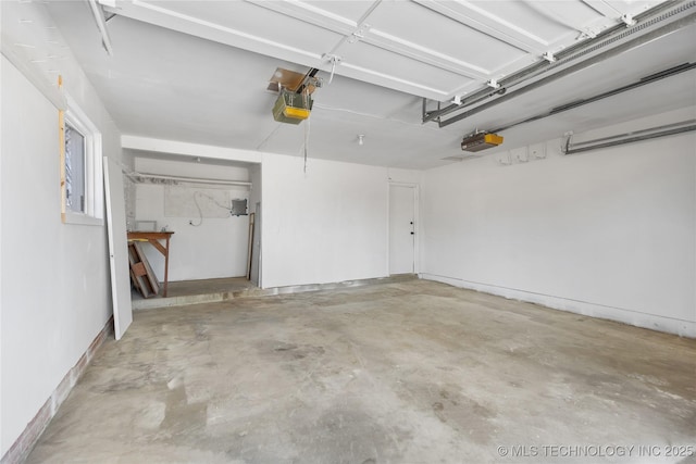 garage featuring a garage door opener