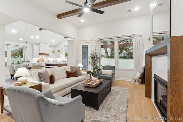 2325 E 134th Cir, Bixby, OK 74008 - living area with ceiling fan, beam ceiling, light wood-type flooring, recessed lighting, and a towering ceiling