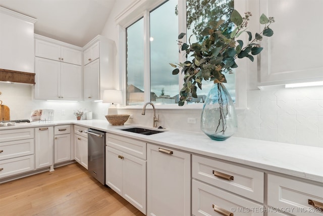 2325 E 134th Cir, Bixby, OK 74008 - kitchen featuring dishwasher, tasteful backsplash, white cabinetry, light wood-type flooring, and light stone countertops