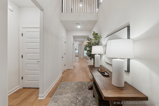 2325 E 134th Cir, Bixby, OK 74008 - hallway with light wood-style floors and a high ceiling