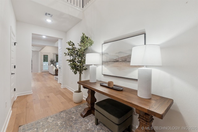 2325 E 134th Cir, Bixby, OK 74008 - hallway with wood finished floors and baseboards
