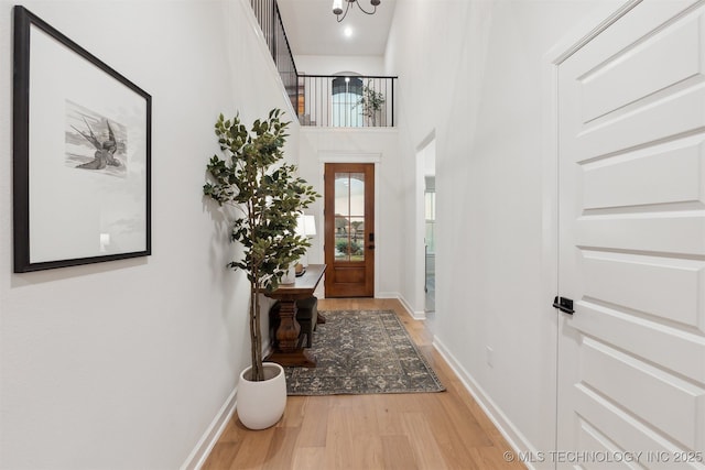 2325 E 134th Cir, Bixby, OK 74008 - entryway with light wood-style floors and baseboards