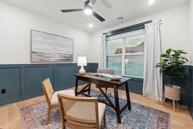 2325 E 134th Cir, Bixby, OK 74008 - office area with a ceiling fan, light wood-style floors, wainscoting, and a decorative wall